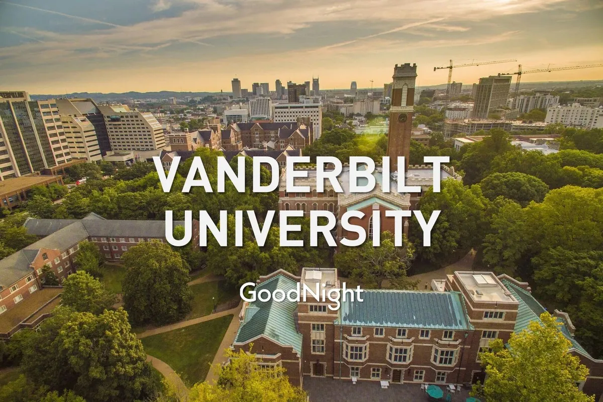 A scenic view of the Vanderbilt University campus, with its iconic clock tower surrounded by the cityscape. The image suggests proximity to major institutions and the broader professional environment of Midtown.